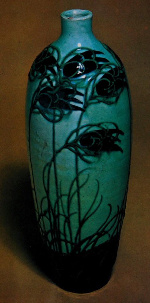 Vase decorated with wind-blown flowers around the side of the vase by Max Laeuger